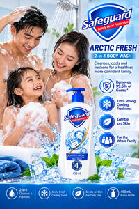Safeguard Arctic Fresh 2-in-1 Body Wash 450 mL pump bottle featured with a smiling family of three in a shower-themed advertisement. Blue water splashes, ice cubes, mint leaves, and product benefit icons highlight cooling freshness, gentle cleansing, and everyday family care.